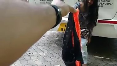Indian girl removes dress on road