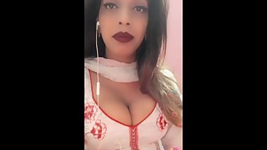 Indian Bhabi in Tight Dress with Big Boobs showing Cleavage